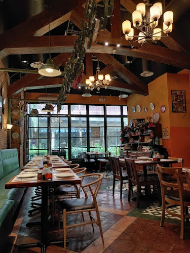 Mama Lou's Italian Kitchen Vertis North restaurant in Quezon City - exterior view and dining atmosphere